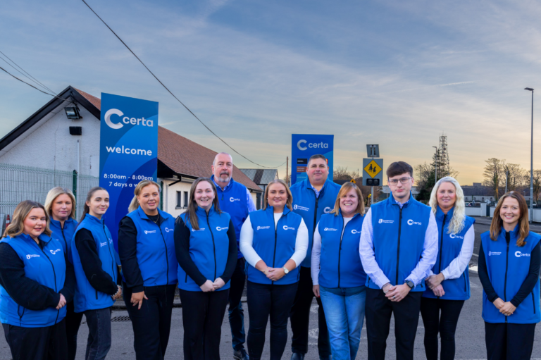 Certa team in front of a Certa depot.